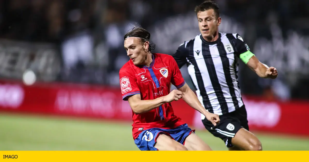 PAOK captain Stefan Schwab fighting for the ball.